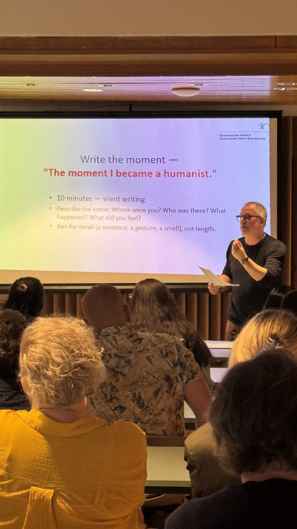 Christian Lisker introduces the writing exercise.